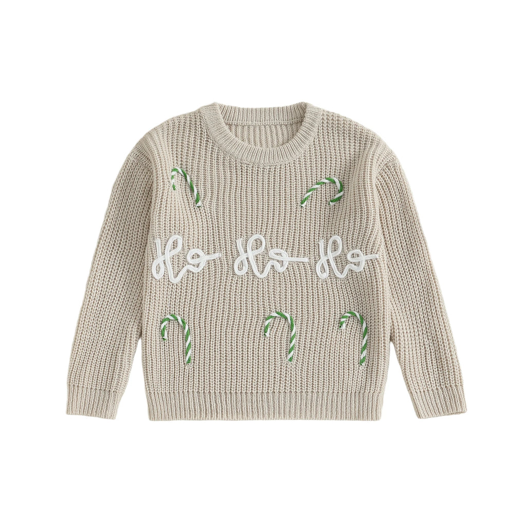 Beige christmas jumper with candy cane designs and 'Ho Ho Ho' text on a white background