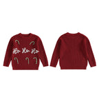 Red Christmas jumper with 'Ho Ho Ho' text and candy cane designs on a white background