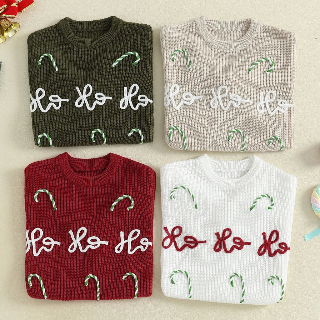 Four Christmas jumpers with 'Ho Ho Ho' text and candy cane designs on a beige background.