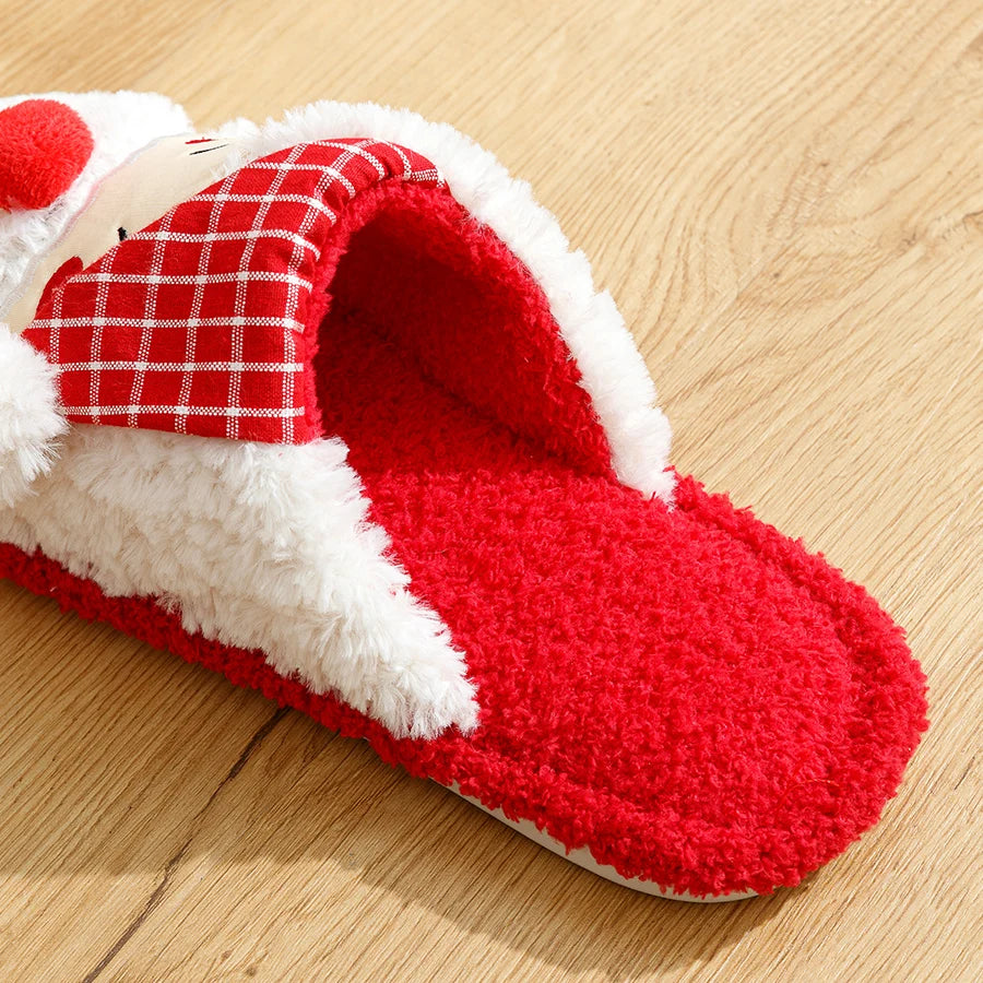 Red and white slipper on a wooden floor