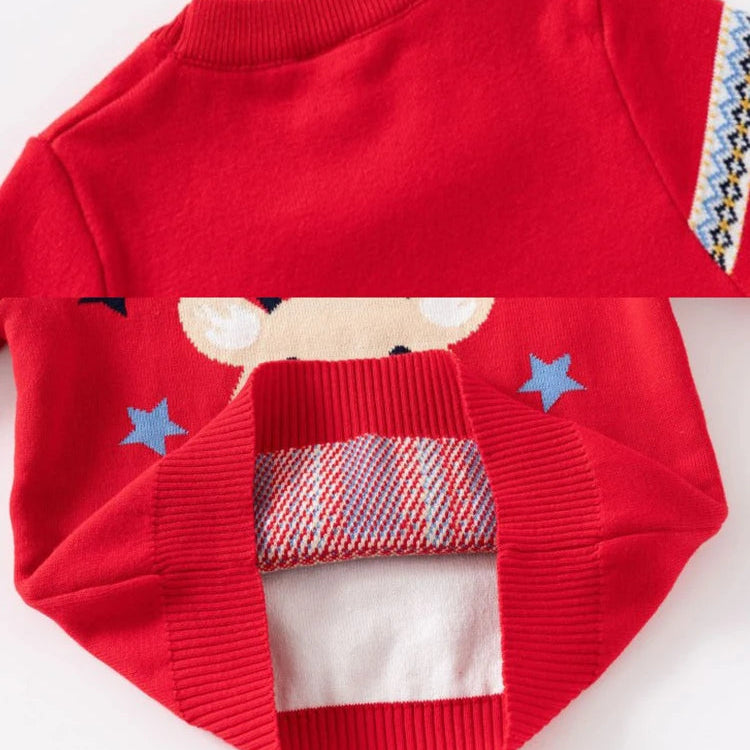 Red sweater with a reindeer design on a white background