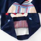 Navy blue sweater with reindeer design on a white background